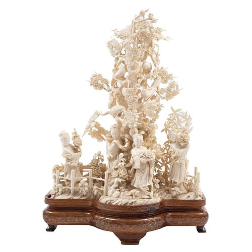 Oriental Scene, China, Ca. 1900. Openwork ivory representing a scene with characters, floral and plant motifs.