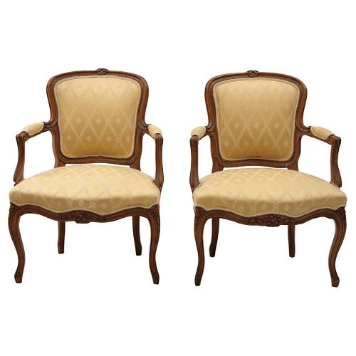 Pair of Armchairs, France, Late 19th century, Louis XV style, Carved wood with floral details