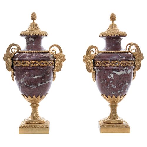 Pair of Jars, Early 20th century, Red marble, gold metal applications.