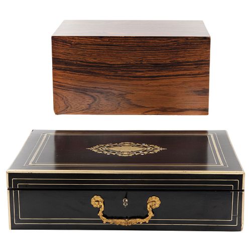 Pair of Cigar Boxes, 20th century, One in carved, polychrome black wood, another in carved DAVIDOFF wood.