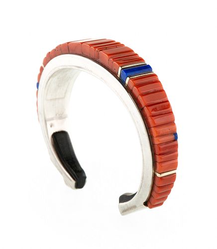 Charles Loloma
(Hopi, 1921-1991)
Silver, Coral, Lapis, and Ironwood Cuff Bracelet, with Gold Accents Lot is located and will ship from Denver, Colorad