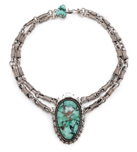Orville Tsinnie
(Dine, 1943-2017)
Heavy Sterling Silver Necklace, with Turquoise Pendant Lot is located and will ship from Denver, Colorado