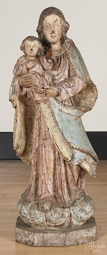 Continental carved and painted walnut figure of the Mother and Child, early 20th c., 51'' h.