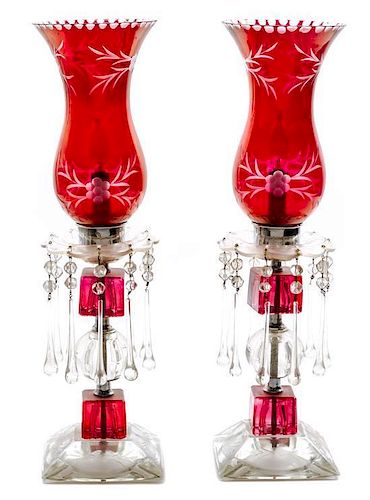 * A Pair of Cranberry Glass Table Lamps Height 21 3/4 inches.