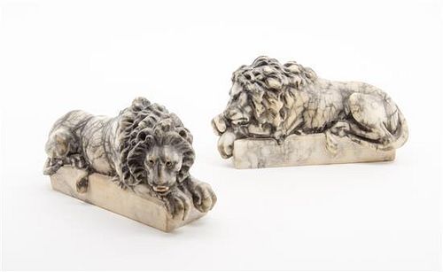* Two Carved Alabaster Lions Length 8 1/2 inches.