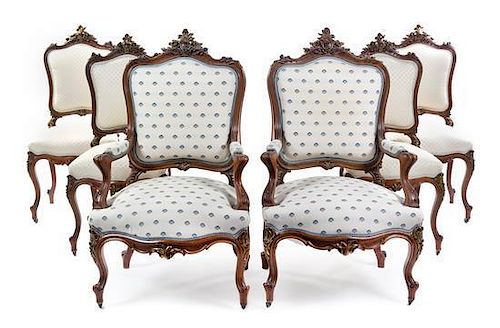 A Louis XV Style Parcel Gilt Walnut Salon Suite Height of canapŽ 45 1/4 x width 56 x depth 23 inches.