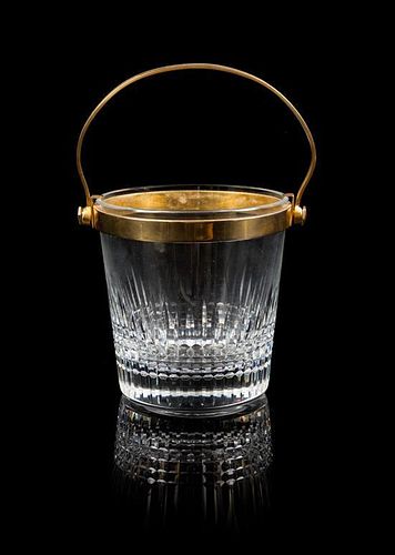 A Baccarat Faceted Glass and Brass Bucket Height 4 1/4 x diameter 4 1/4 inches.