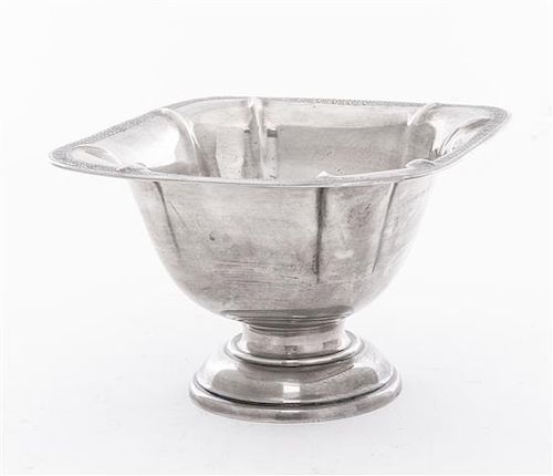 An American Silver Bowl, International Silver Co., Meriden, CT, rectangular, the border chased with flower heads, raised on a ci