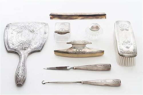 A Seven Piece Silver Dresser Set, Gorham, comprising a hand mirror, clothes brush, hair comb, nail buff, nail file, button hook