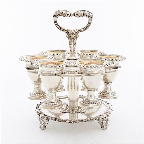 * A Sheffield-plate Egg Cup Set, Mappin Bros, Sheffield, Early 20th Century, comprising a stand with six cups, each cup having d