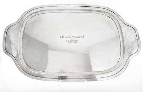 * An American Silver-plate Two-Handled Tray, Circa 1914, rounded rectangular with slightly domed bracket handles, center engrave