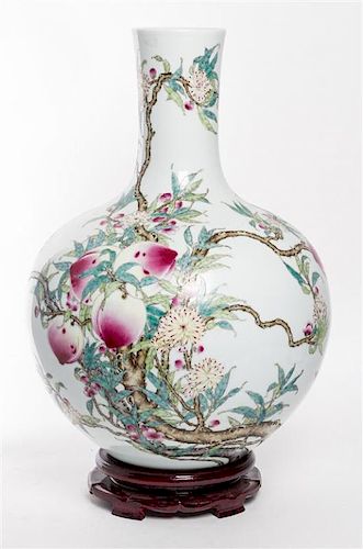 A Large Famille Rose Porcelain Vase, Tianqiuping Height 19 1/2 inches.