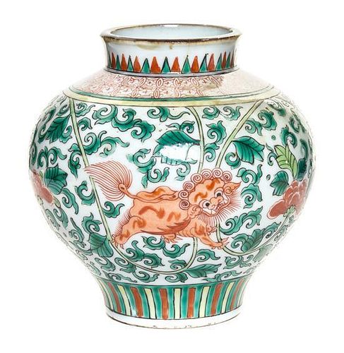 A Wucai Porcelain Jar Height 5 3/4 inches.