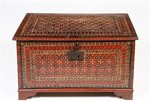An Anglo-Moorish Mother-of-Pearl Inlaid Trunk Height 19 x width 34 1/2 x depth 18 inches.
