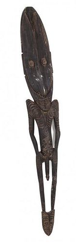 A Carved Wood Figure Height 47 inches.