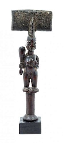 * An African Carved Harwood Staff Head Height 13 1/4 inches.