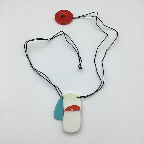 Carved glass necklace with nylon cord
