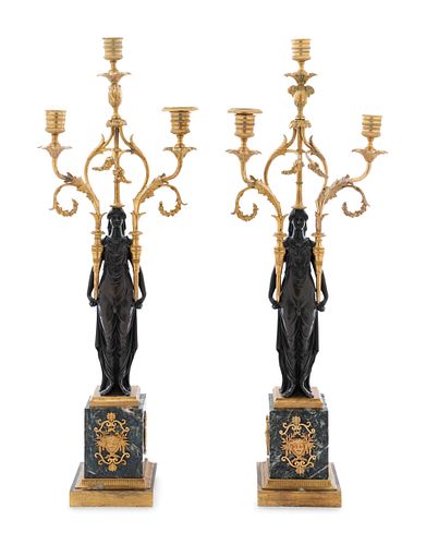 A Pair of Empire Gilt and Patinated Bronze and Marble Three-Light Figural Candelabra