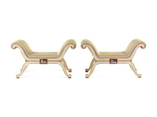 A Pair of Russian Parcel Gilt and White-Painted Window Seats