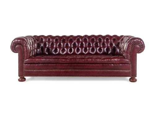 A Tufted Faux Leather Upholstered Chesterfield Sofa