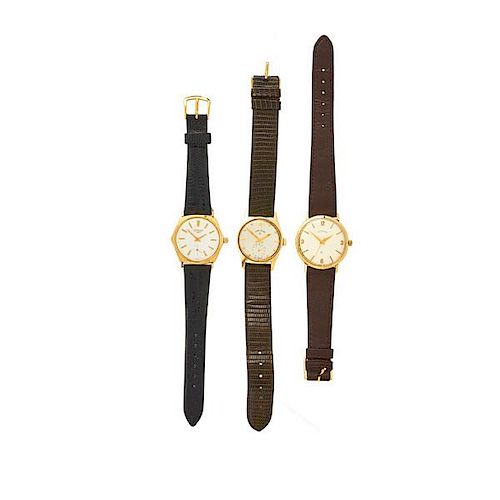 THREE MID SIZED 14K GOLD MECHANICAL WRISTWATCHES