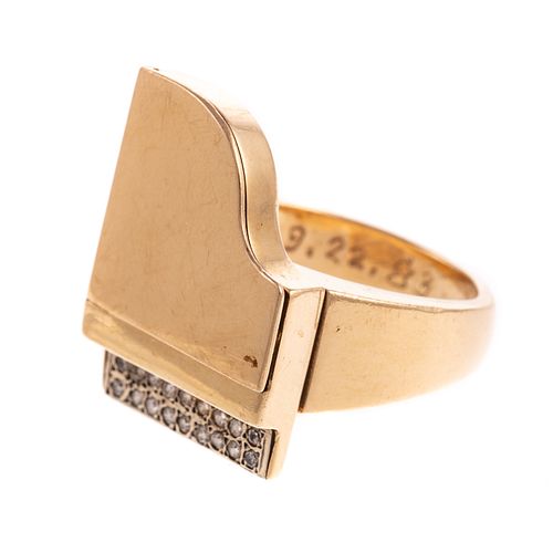 A Movable Piano Ring with Diamonds in 18K