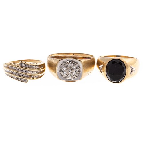 A Trio of Diamond & Black Onyx Rings in Gold