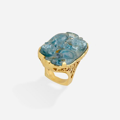 Carved aquamarine and gold ring