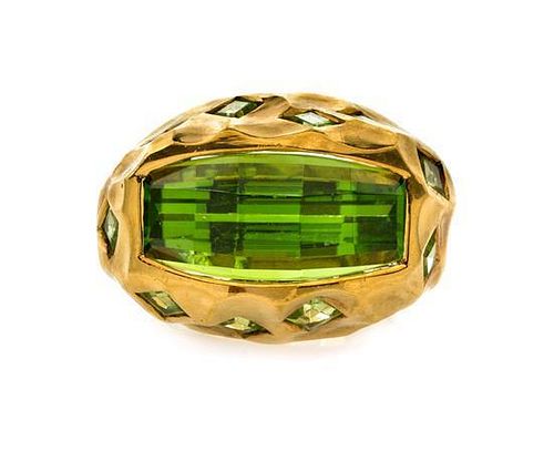 An 18 Karat Yellow Gold and Peridot Ring, Tony Duquette, 15.90 dwts.
