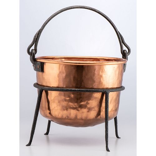 A Copper Apple Butter Kettle on Stand