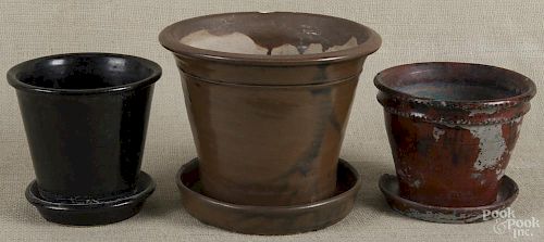 Three earthenware flowerpots, late 19th c., 6 3/4'' h., 5 1/4'' h., and 4 3/4'' h.