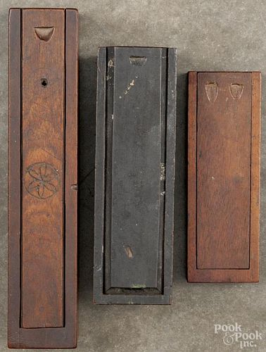 Three Pennsylvania slide lid pencil boxes, 19th c., one painted and dated 1841, longest - 9''.