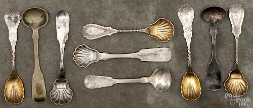 Nine coin silver tea caddy spoons of various makers, 2.3 ozt.