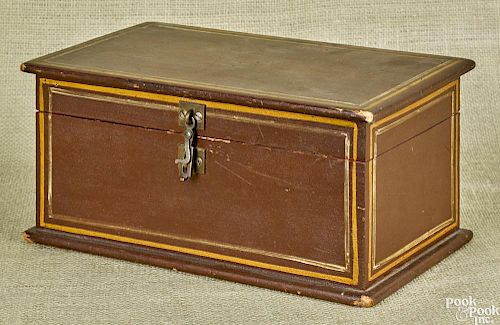 Painted pine dresser box, 19th c., retaining its original brown/red surface, 5 1/4'' h., 11 1/2'' w.