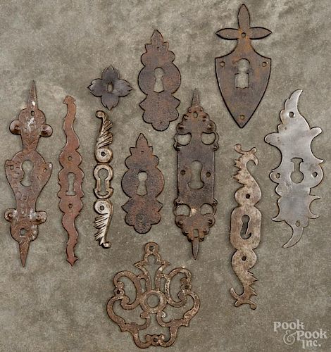 Eleven wrought iron escutcheons, 18th/19th c., largest - 6 1/4'' h.