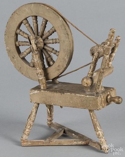 Miniature carved and painted spinning wheel, 19th c., retaining an old surface, 8 5/8'' h.