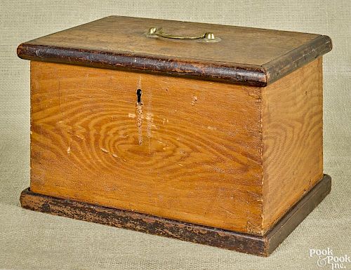 Pennsylvania painted pine lock box, 19th c., retaining its original ochre grain decoration, 8'' h.
