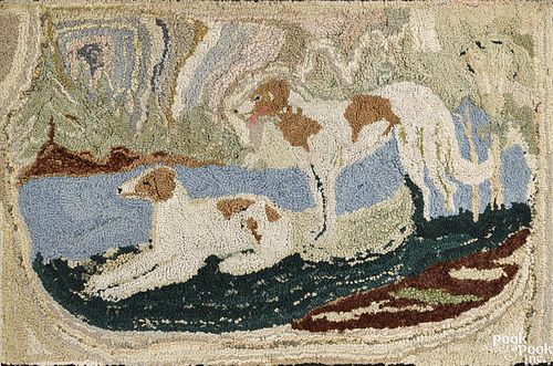 American hooked rug, early 20th c., of two hounds, 23'' x 35 1/2''.