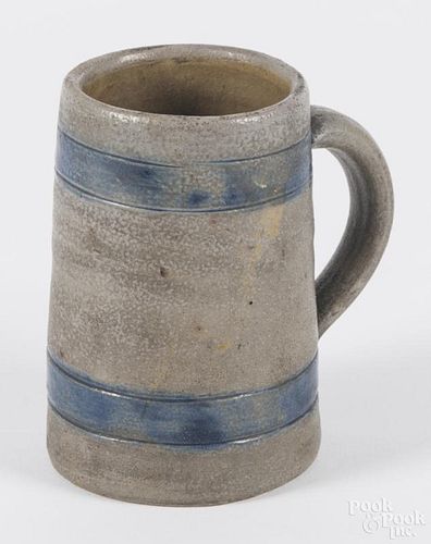 Pennsylvania stoneware mug, 19th c., with cobalt bands, 4 3/8'' h.