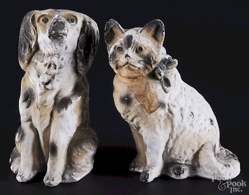 Chalkware cat and dog penny banks, early 20th c., 9 1/2'' h.