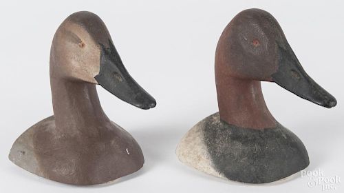 Pair of painted cast iron duck head bookends, 5 3/4'' h.