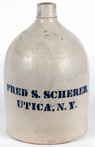 New York two-gallon stoneware jug, 19th c., inscribed Fred S. Scherer Utica, N.Y., 14'' h.