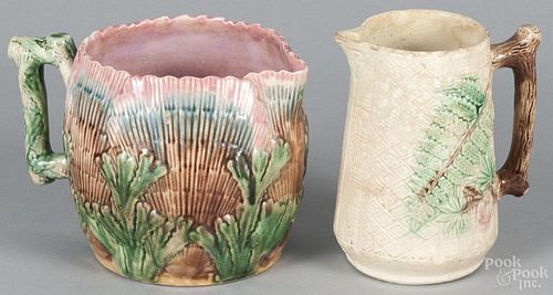 Etruscan Majolica shell pitcher, 5 1/2'' h., together with another pitcher, 6 1/4'' h.
