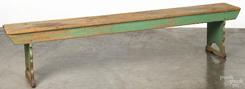 Painted pine mortised bench, 19th c., retaining a later green surface, 18 1/4'' h., 84'' w.