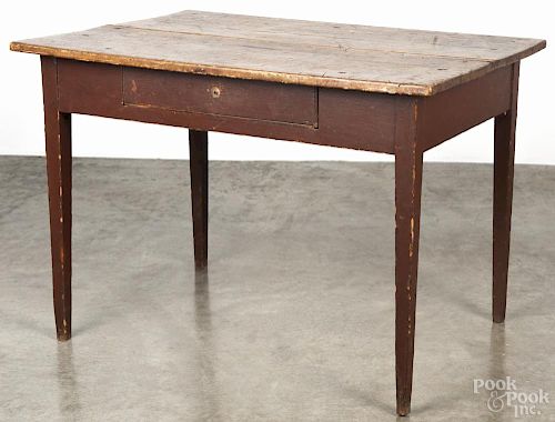 Painted pine work table, 19th c., with a scrub top and an early red base, 29'' h., 42'' w., 28 3/4'' d.