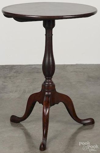Pennsylvania walnut candlestand, late 18th c., retaining an old dark surface, 27 1/2'' h., 20 1/4'' w.