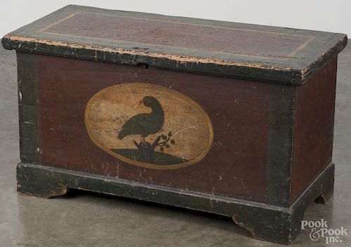 Painted pine blanket chest, early 19th c., retaining its original decoration with a central vignette