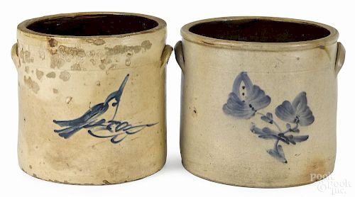 Two cobalt decorated four-gallon stoneware crocks, 19th c., to include one with a bird, 11'' h.