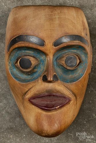 Northwest coast carved and painted cedar mask, 4 3/4'' x 3 1/4''.