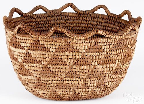 Northwest coast woven basket, ca. 1900, 5 1/2'' h., 9'' w. Provenance: DeHoogh Gallery, Philadelphia.